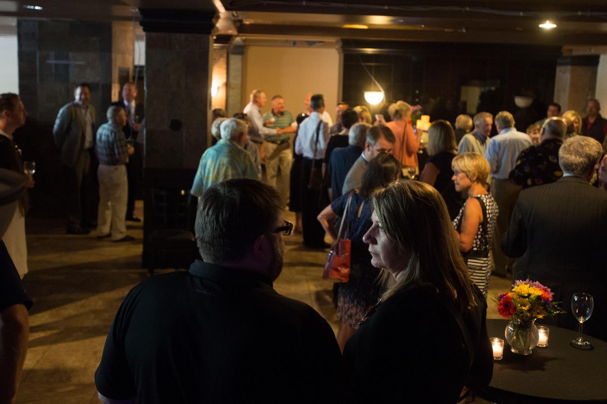 Tyson Sicilia and Esa Lariviere, owners of the Observatory, mingle with other guests at the Ridpath on Thursday, July 6, 2017, in Spokane, Wash. (Tyler Tjomsland / The Spokesman-Review)