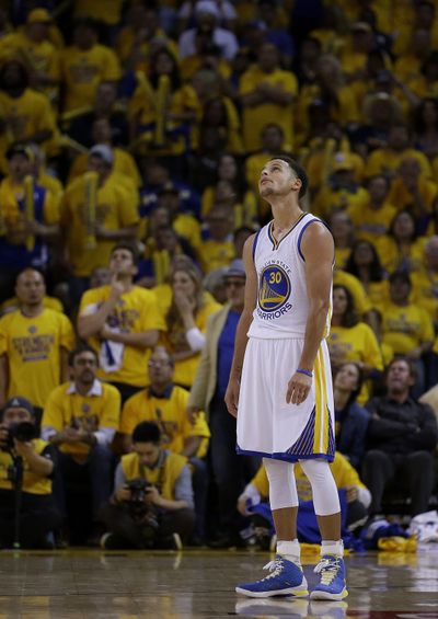 Golden State’s Stephen Curry is dejected after loss to Memphis. (Associated Press)