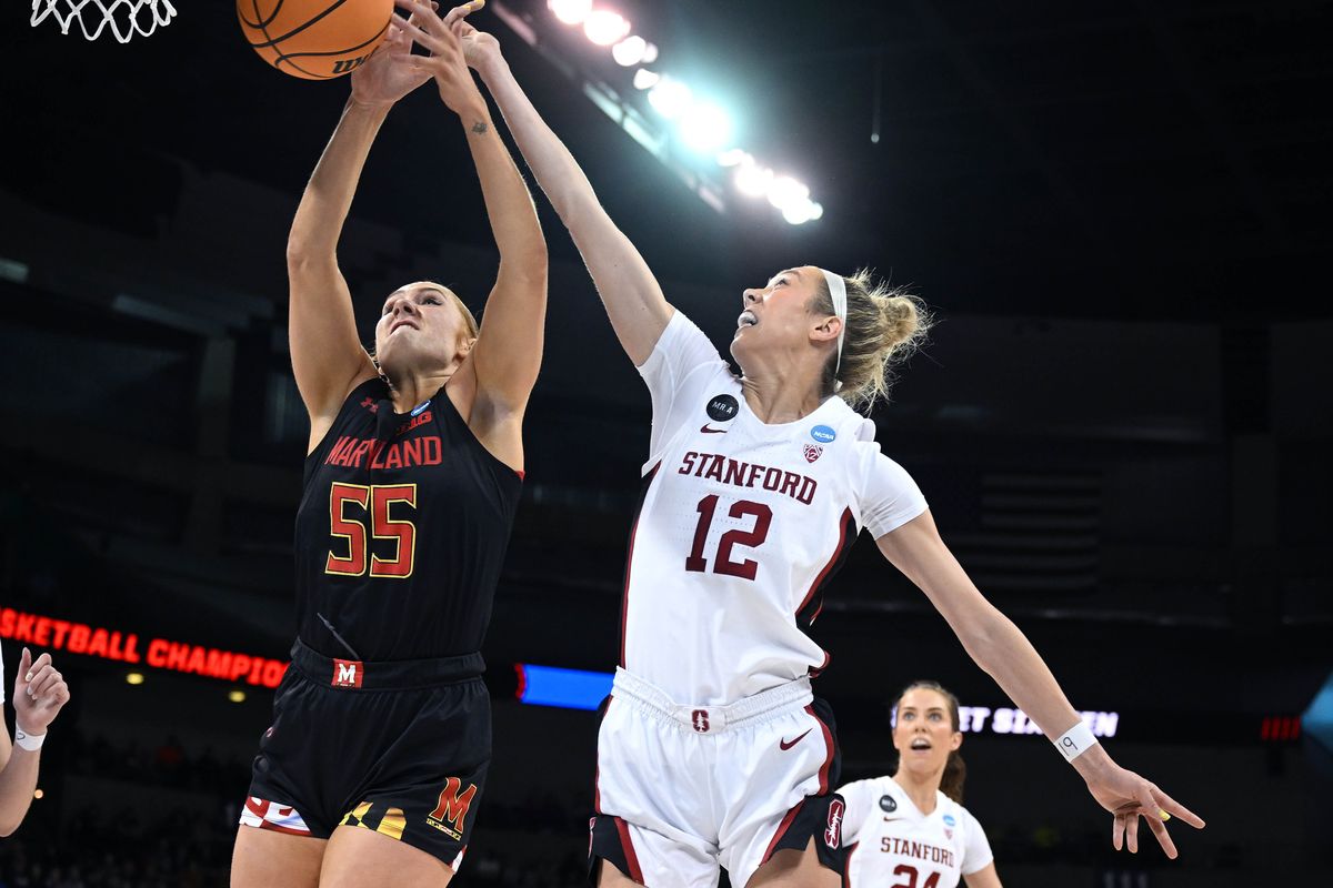 Stanford guard Lexie Hull blocks a shot by Maryland forward Chloe Bibby during the first half of Friday’s NCAA Tournament regional at the Arena.  (COLIN MULVANY/THE SPOKESMAN-REVIEW)