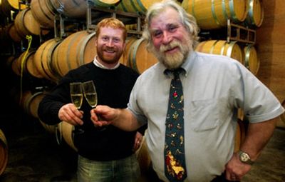 
Erik Manz, left, and his father, Michael, toast one another with a glass of Mountain Dome Winery''s 1999 Cuvee Forte, a sparkling wine that retails for about $35. 
 (Kathryn Stevens / The Spokesman-Review)
