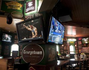 All of the TVs were tuned to basketball at Capone’s Pub & Grill in Coeur d’Alene on Wednesday, March 29, 2017. (Kathy Plonka / The Spokesman-Review)
