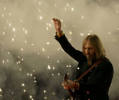 Tom Petty performs with his band, Tom Petty and the Heartbreakers, during halftime of the Super Bowl XLII football game between the New England Patriots and New York Giants at University of Phoenix Stadium in 2008 in  Glendale, Ariz.  (Associated Press)