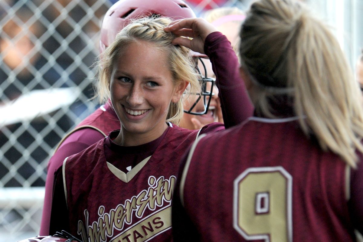 Karly Schuh smiles after her three-run homer in the second. (Jesse Tinsley)