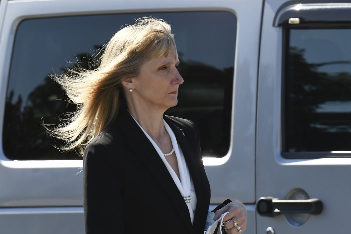 Schoharie County District Attorney Susan Mallery is seen walking to a converted courtroom at the Schoharie High School gymnasium to accommodate more people during the trial of Nauman Hussain, who is charged with 20 counts of second degree manslaughter and criminally negligent homicide in the 2018, limousine crash Thursday, Sept. 2, 2021, in Schoharie, N.Y.  (Hans Pennink)