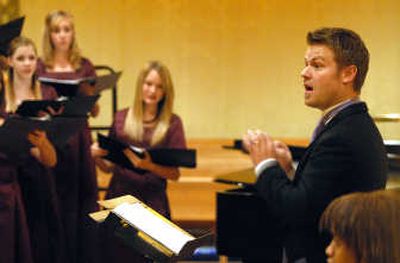 
Director Russell Seaton conducts the Chanteuse Treble Choir from University High School in a concert of sacred music at St. John's Episcopal Cathedral. The choir of 75 young women sings year-round. 
 (Jesse Tinsley / The Spokesman-Review)
