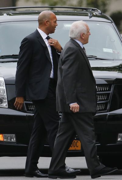 Former Yankees pitcher Mariano Rivera, left, arrives at Yogi Berra’s funeral services. (Associated Press)