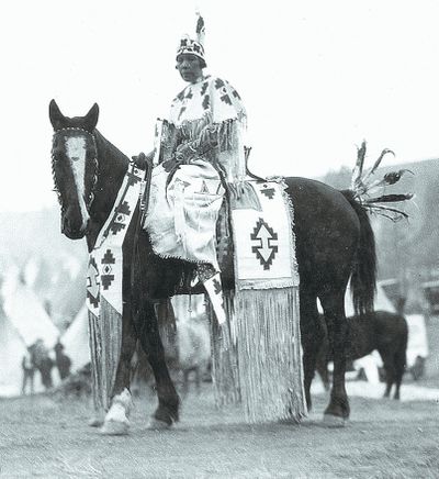 An inidentified woman on horseback at Indian Congress in Spokane in 1925, photographed by Asahel Curtis and part of the MAC’s “Lasting Heritage” exhibit.