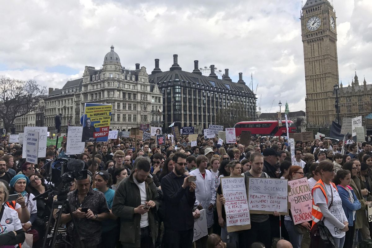 Scientists protest in Parliament Square, central London, during the March for Science, Saturday, April 22, 2017. Thousands of scientists worldwide made plans to leave their labs and take to the streets Saturday to rail against what they say are mounting attacks against science. (Jack Hardy / Associated Press)