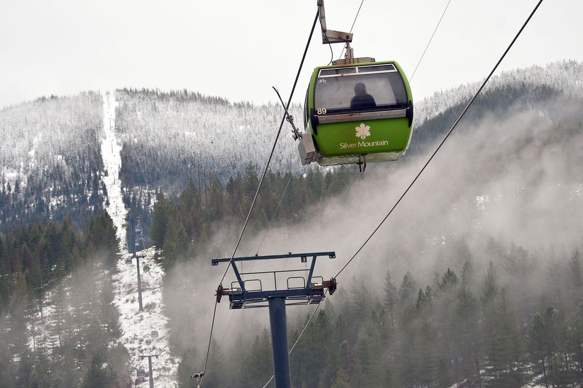 A skier rides the gondola down from Silver Mountain after an avalanche claimed the lives of two people on Tuesday, Jan. 7. (Kathy Plonka / The Spokesman-Review)