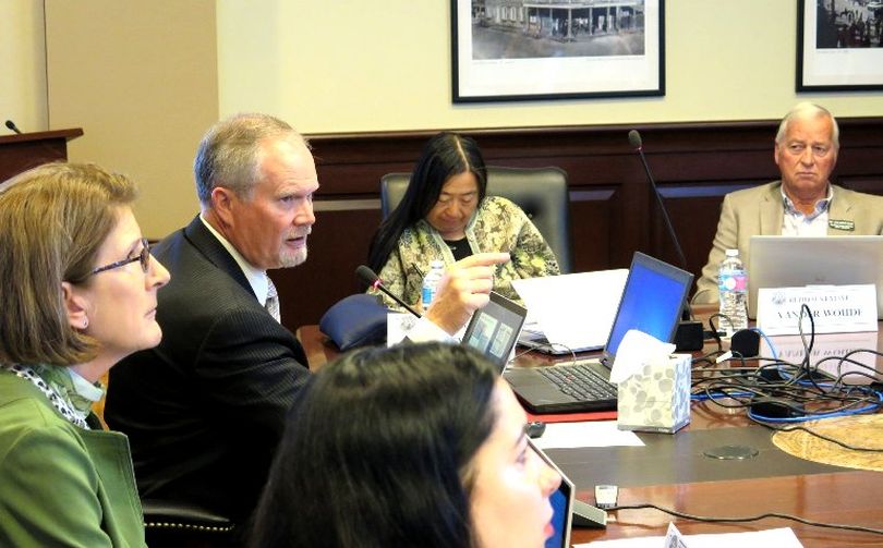 Sen. Marv Hagedorn, R-Meridian, second from left, makes his pitch Monday to fellow members of the Legislature's working group on health coverage. At right is Rep. John VanderWoude, R-Nampa. (Betsy Z. Russell)