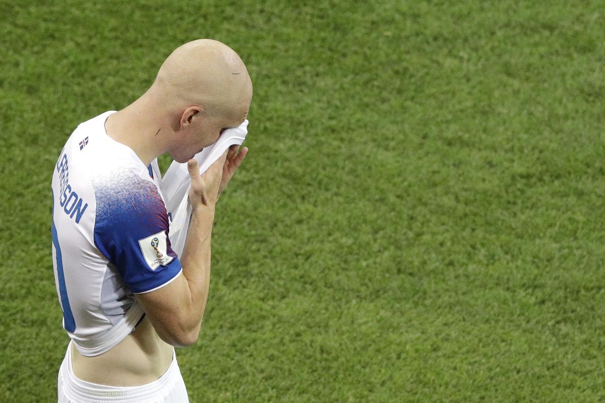 Iceland’s Emil Hallfredsson wipes his face at the end of the Group D match between Iceland and Croatia, at the 2018 soccer World Cup in the Rostov Arena in Rostov-on-Don, Russia, Tuesday, June 26, 2018. (Mark Baker / Associated Press)