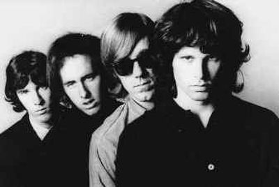 
 Jim Morrison was a father figure to Sugerman. The surviving members of the Doors, John Densmore, Robbie Krieger and Ray Manzarek, called Sugerman the force behind the band. 
 (File/Associated Press / The Spokesman-Review)