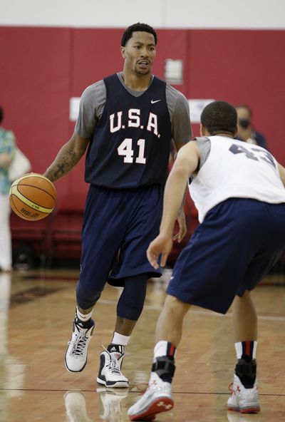 Chicago’s Derrick Rose, who is recovering after two knee surgeries, made a brief appearance at Team USA’s practice. (Associated Press)