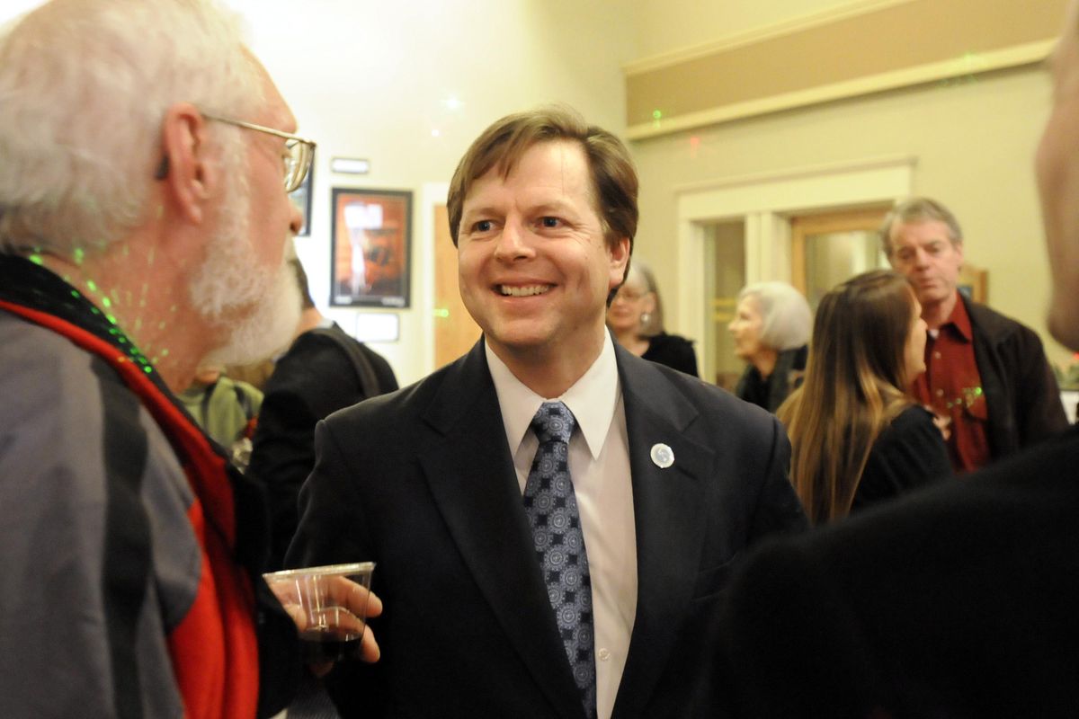 Then-Center for Justice Director Breean Beggs, center, talks with supporters on Jan. 20, 2009 at a reception in the lobby of the Community Building in Spokane. At the time, the center has a staff of up to 15 attorneys and staff that provided legal representation and advice to the poor. (Jesse Tinsley / The Spokesman-Review)