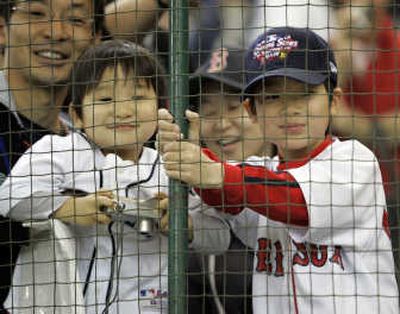 
Associated Press Japanese baseball fans of all ages enjoyed watching the Boston Red Sox.
 (Associated Press / The Spokesman-Review)