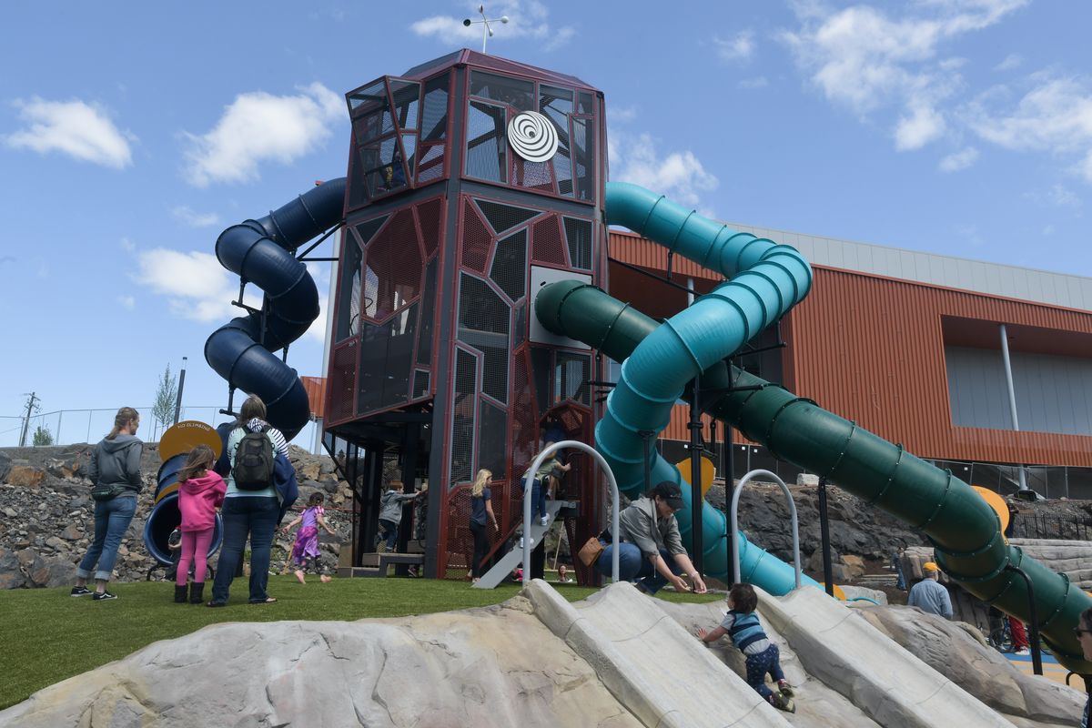 Visitors check out the newly opened Riverfront Ice Age Floods Playground on Friday, May 21, 2021, in Spokane, Wash.  (Tyler Tjomsland/The Spokesman-Review)