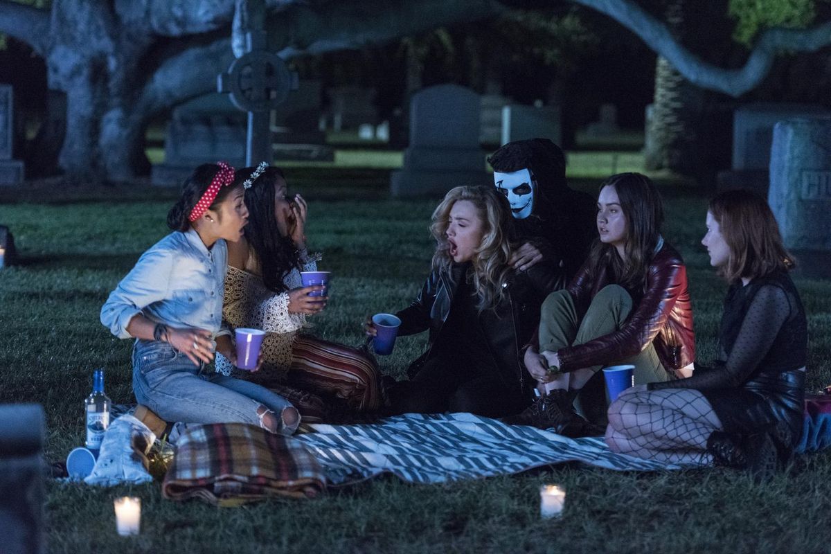 Four best friends invite the shy new girl out on Halloween, but they soon regret their decision when she suggests they play a twisted version of Light as a Feather, Stiff as a Board. (Rachael Thompson / Hulu)