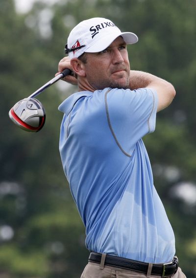 George McNeill tees off on the 10th hole during the second round of the Viking Classic. McNeill and Troy Matteson lead at 12 under. (Associated Press)