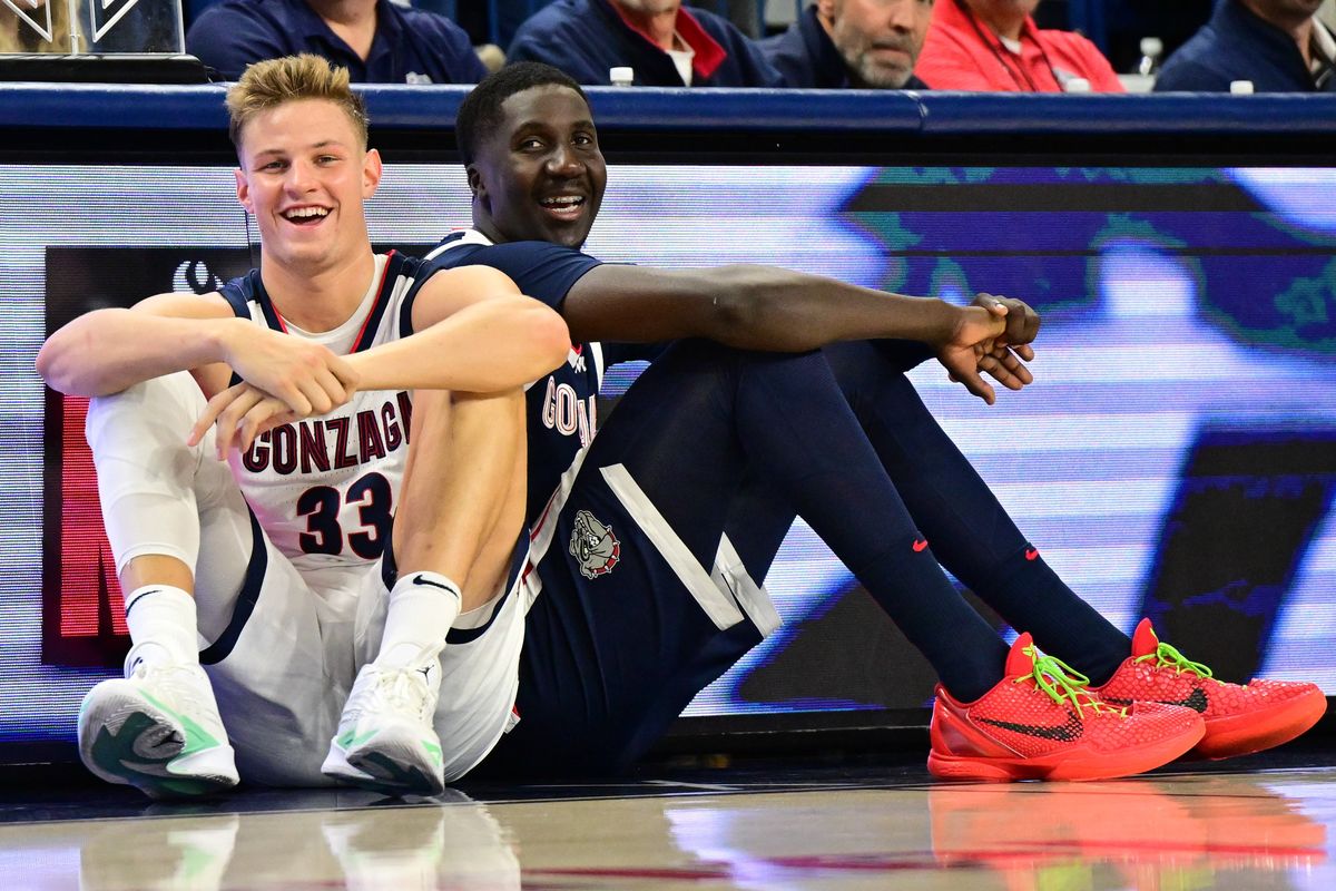 Gonzaga forward Ben Gregg laughs with center Ismaila Diagne Saturday as they wait to enter the game during Kraziness in the Kennel at McCarthey Athletic Center.  (Tyler Tjomsland/The Spokesman-Review)