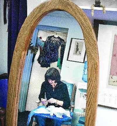 
Linda Graff works on a skating outfit at her store Thursday near 29th Avenue and Regal Street. 
 (Christopher Anderson / The Spokesman-Review)