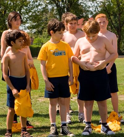 Robert Capron, right, explores the wonders of his belly button, as classmates Zachary Gordon, center, and Karan Brar, left, look on during a scene from “Diary of a Wimpy Kid.” 20th Century Fox (20th Century Fox)