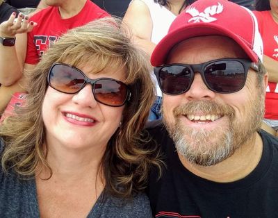 Derek and Cindy Hval on one of their favorite dates – attending an Eastern Washington football game. They hope to be able to do that again soon.  (Courtesy of Cindy Hval)