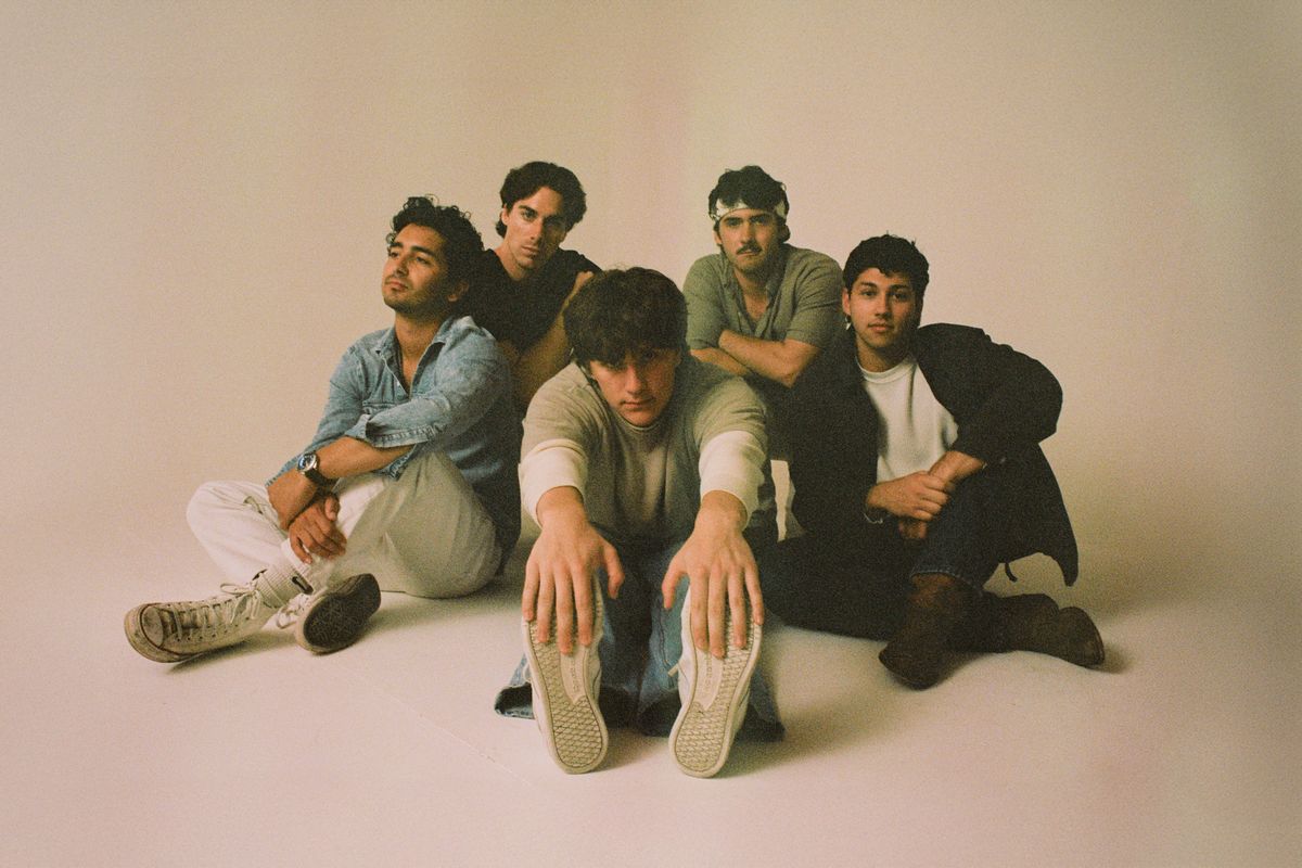 From left, is West 22nd, Jeremy Acheta (lead guitarist), Liam Mackle (drums), Logan Madsen (lead vocalist), Jet Beck (bass) and Gabe Acevedo (rhythm guitarist). The indie rock band will play on March 26 at the District Bar.  (Courtesy of Brandon Mosley)