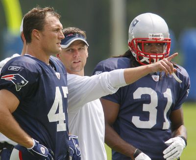 New England Patriots’ John Lynch, left, a nine-time Pro Bowl safety, was acquired from the Denver Broncos.  (Associated Press / The Spokesman-Review)