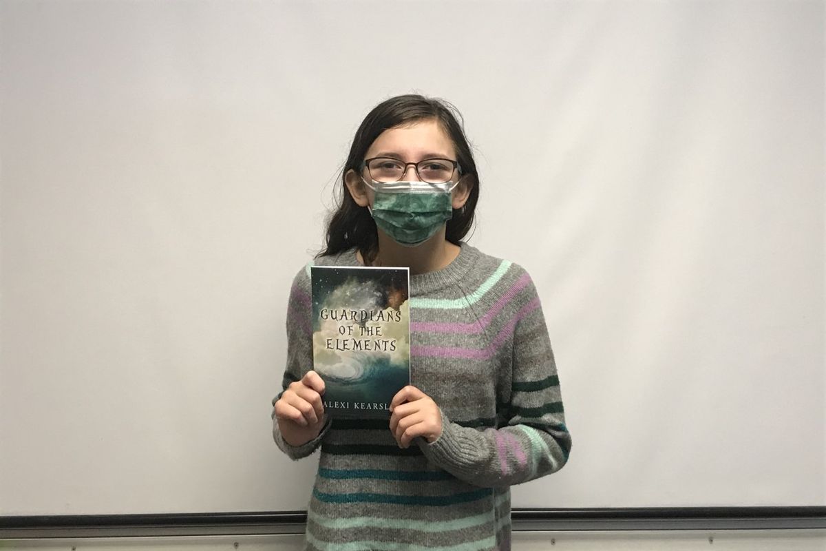 Alexi Kearsley, a fifth-grader at Ness Elementary School in Spokane Valley, has released her first book, “Guardians of the Elements,” a fantasy novel.  (Nina Culver/For The Spokesman-Review)