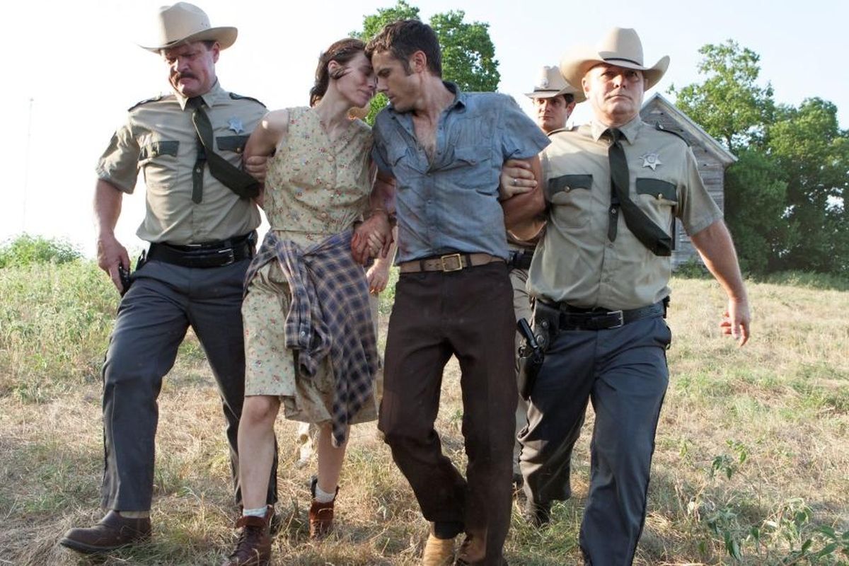 Rooney Mara and Casey Affleck (center) star in “Ain’t Them Bodies Saints,” now streaming on Hulu. (Steve Dietl)