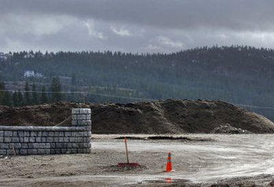 
Mounds of dirt sit in the empty lot at Pines and 32nd Avenue. Burials at the new Pines Cemetery could take place in mid-summer.
 (Liz Kishimoto / The Spokesman-Review)