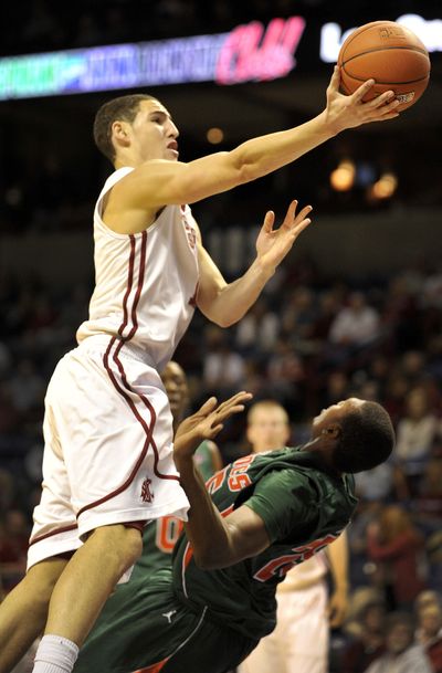 WSU’s Klay Thompson heads for the basket over Texas-Pan American’s Josh Cleveland.  (Colin Mulvany)