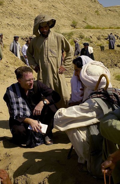 New York Times reporter David Rohde interviews Afghans in the Helmand region of Afghanistan in 2007. Rohde, known for making investigative trips inside dangerous conflict zones, escaped from militant captors after more than seven months in captivity. New York Times (File New York Times / The Spokesman-Review)