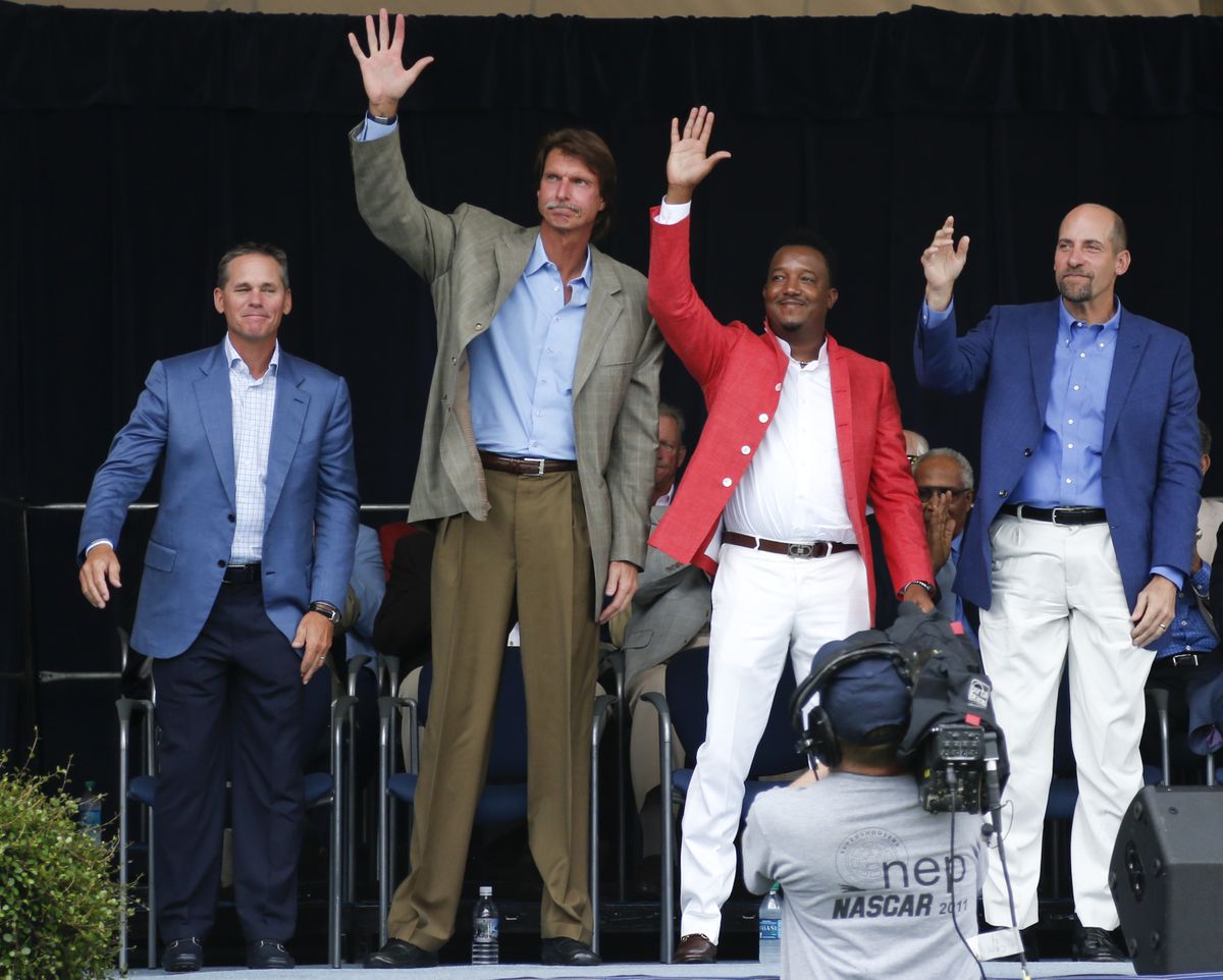 Craig Biggio, Randy Johnson, Pedro Martinez and John Smoltz, left to right, will be enshrined today. (Associated Press)
