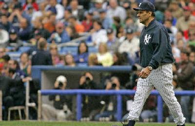 
New York manager Joe Torre makes one of many walks to the mound this season. 
 (Associated Press / The Spokesman-Review)