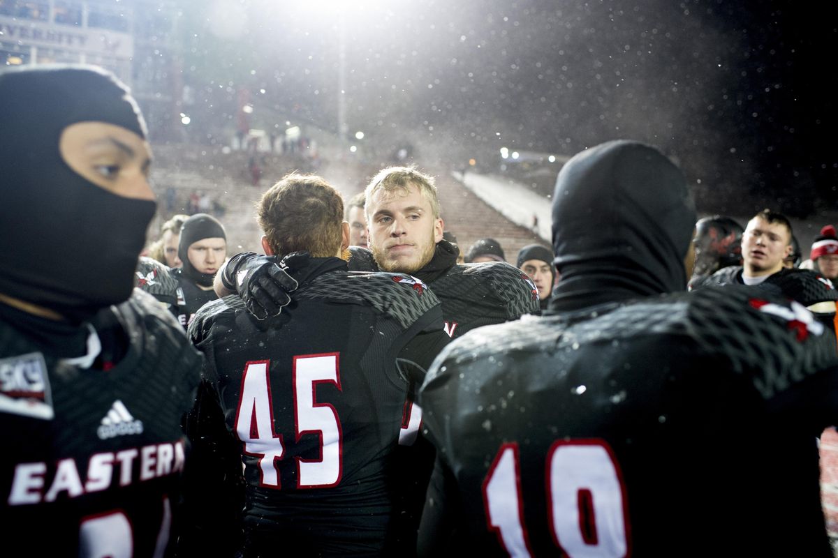 Eastern Washington Eagles wide receiver Cooper Kupp (10) embraces teammates after falling to Youngstown State during the second half of an FCS football game on Saturday, Dec 17, 2016, at Roos Field in Cheney, Wash. Youngstown State won the game 40-38. (Tyler Tjomsland / The Spokesman-Review)