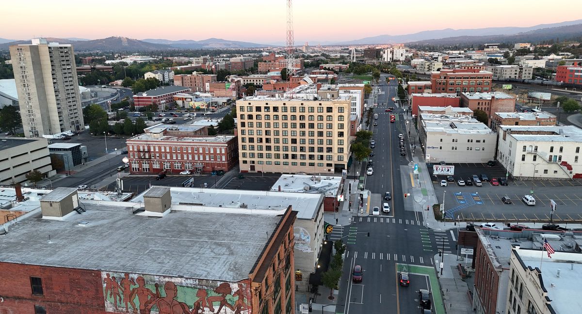 Present Day: The Realty Building, center, constructed of light-colored brick on the north side of Riverside Avenue, has been the Delaney Apartments for more than 50 years. (Jesse Tinsley/THE SPOKESMAN-REVIEW)