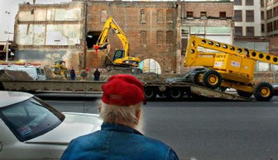 
Demolition of the Rookery builiding began Wednesday as promised by the owners. Several groups have tried to save the historic structure from being razed. 
 (Christopher Anderson/ / The Spokesman-Review)