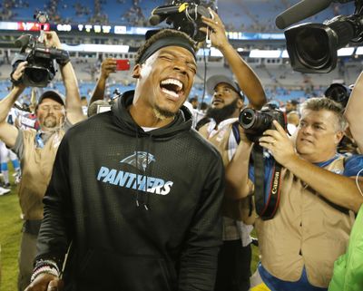 In this Aug. 9, 2017 photo, Carolina Panthers quarterback Cam Newton laughs after the second half of an NFL preseason football game against the Houston Texans, in Charlotte, N.C. Cam Newton is a former league MVP and the long-time face of the Panthers franchise. But it’s hard not to wonder if his future in Carolina is coming to an end following his recent spate of injuries. (Jason E. Miczek / Associated Press)