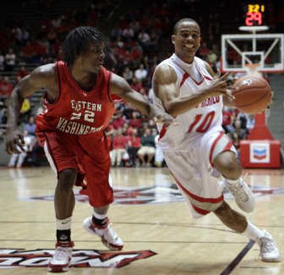 
New Mexico's Jamaal Smith, right, drives past Eastern Washington's Trey Gross on Monday in Albuquerque. Associated Press
 (Associated Press / The Spokesman-Review)