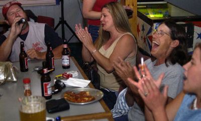 
George Orne garners applause at the end of his solo during karaoke night at Brewski's Pub and Grub.
 (Liz Kishimoto / The Spokesman-Review)
