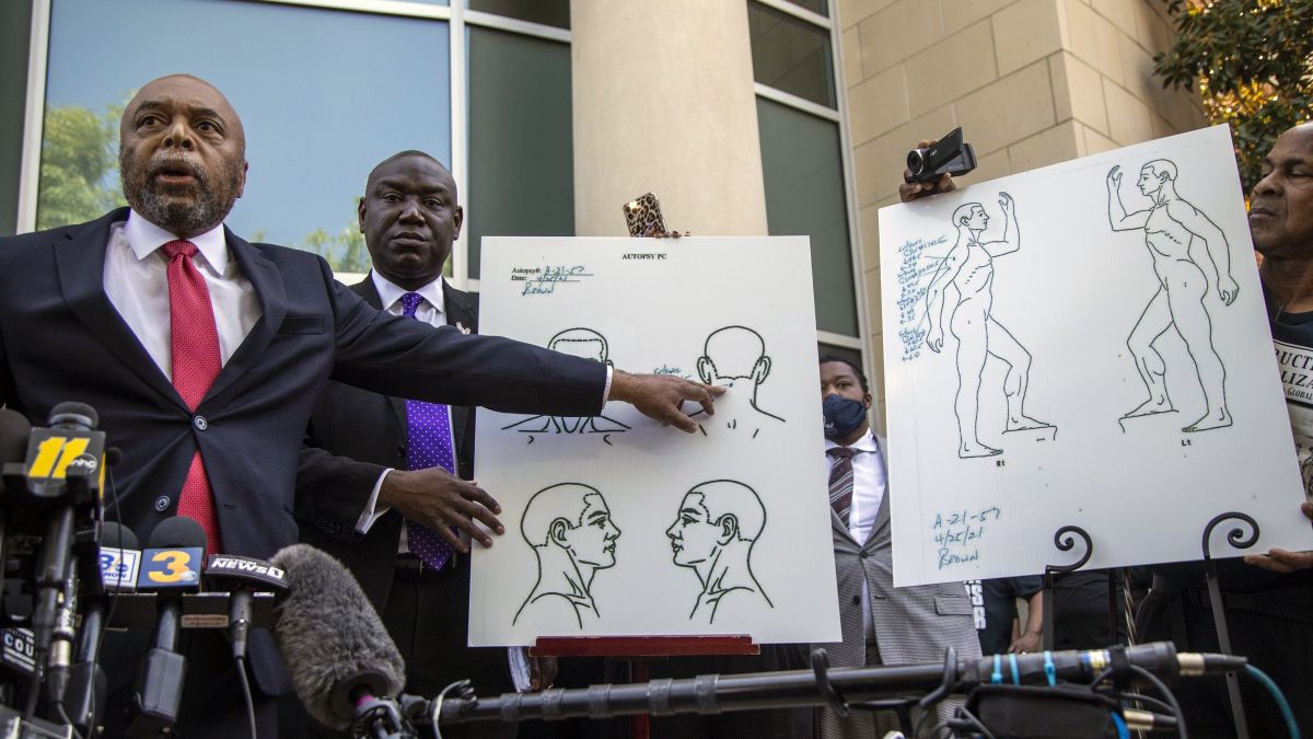 Attorneys for the family of Andrew Brown Jr., Wayne Kendall, left, and Ben Crump hold a news conference Tuesday, April 27, 2021 outside the Pasquotank County Public safety building in Elizabeth City, N.C., to announce results of the autopsy they commissioned. The attorneys say an independent autopsy shows that Brown, a Black man, was shot five times, including in the back of the head. Brown was shot Wednesday by deputies serving drug-related search and arrest warrant.  (Travis Long)