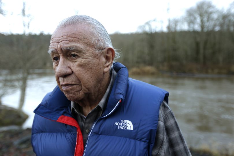 In this January photo, Billy Frank Jr. poses for a photo near Frank’s Landing on the Nisqually River in Nisqually, Wash. Frank died Monday. (Associated Press)