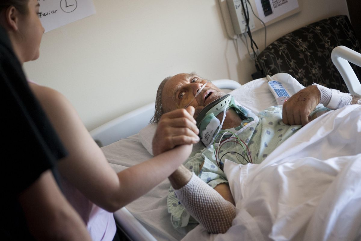 Merrill Smith holds hands with his granddaughter, Caitlyn Smith, on Friday at Sacred Heart Medical Center in Spokane. Smith was seriously injured and his wife, Judie, was killed in a head-on crash on Bigelow Gulch Road.
Deputies arrested Shelly R. Riley, 30, on Thursday morning. Riley faces charges of vehicular homicide, vehicular assault, unlawful imprisonment, fourth-degree assault, reckless endangerment and driving with a suspended license. (Tyler Tjomsland / The Spokesman-Review)