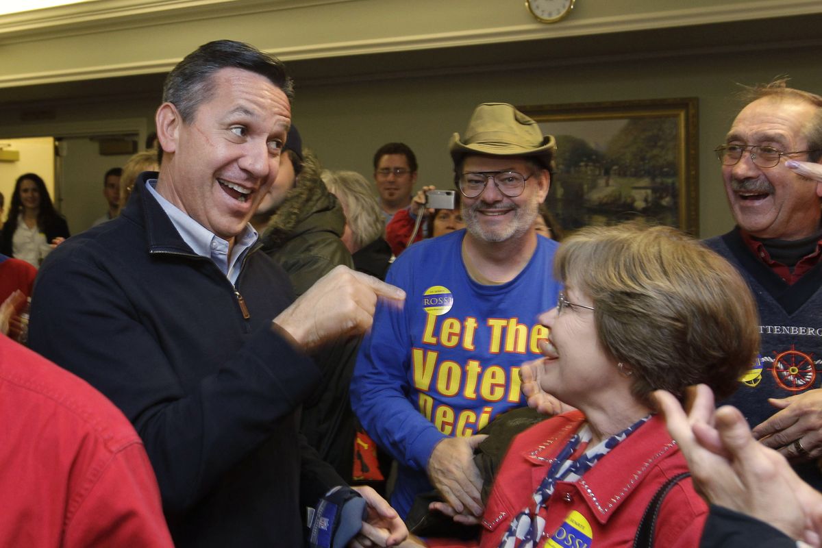 Republican Senatorial candidate Dino Rossi, left,  greets supporters at a political rally in Puyallup, Wash., Monday, Nov. 1, 2010, the day before Election Day. (Ted S. Warren / Associated Press)