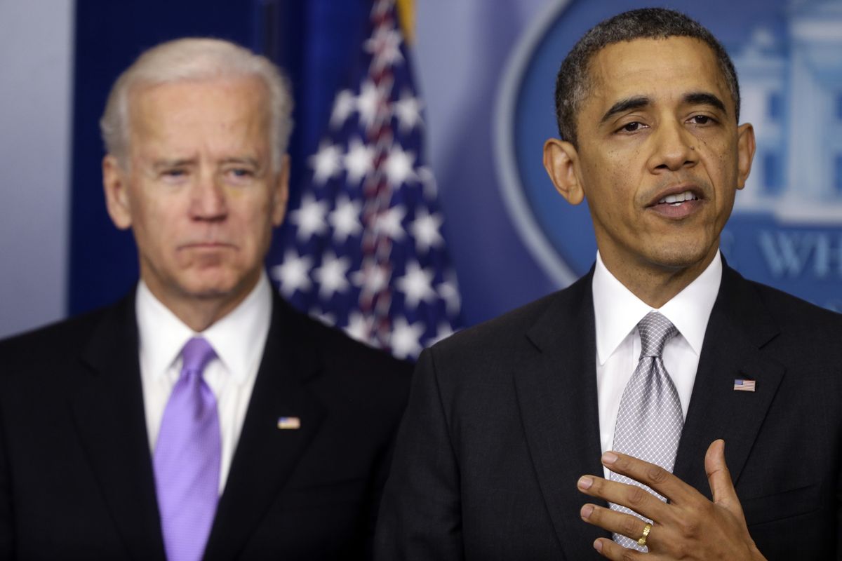President Barack Obama stands with Vice President Joe Biden as he makes a statement Wednesday, Dec. 19, 2012, in the Brady Press Briefing Room at the White House in Washington, about policies he will pursue following the massacre at Sandy Hook Elementary School in Newtown, Ct. Obama is tasking Vice President Joe Biden, a longtime gun control advocate, with spearheading the effort. (Charles Dharapak / Associated Press)