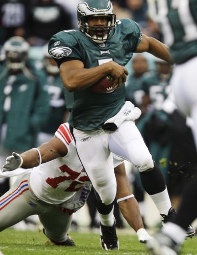 Donovan McNabb is Eagles’ all- time passing leader in attempts, completions, yards and TDs. (Associated Press)