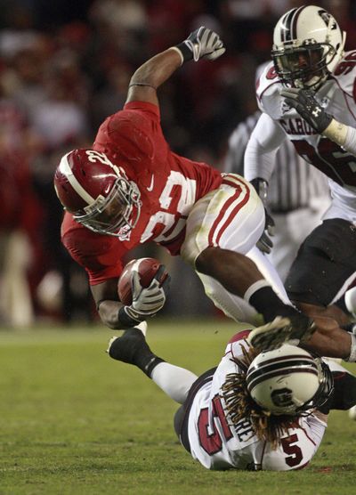 Mark Ingram and the Crimson Tide have jumped over Florida into top of AP poll.   (Associated Press / The Spokesman-Review)