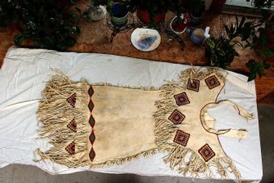 
Ed Lohoff, a Deer Park chiropractor, received this Flathead Tribe wedding dress from a grateful client. 
 (Jed Conklin / The Spokesman-Review)