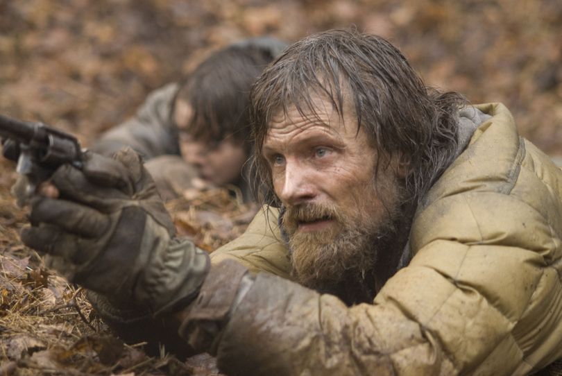 In this film publicity image released by The Weinstein Company, Viggo Mortensen, right, and Kodi Smit-McPhee are shown in a scene from, 